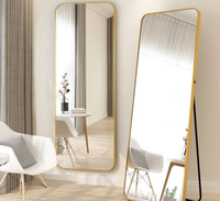 Miroir décoratif rond avec cadre doré, grand format sur pied en métal, pour le salon