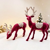 Figurine de renne floqué rouge de Noël en gros, avec bois de cerf à paillettes, statue de cerf pour la décoration de table de fêtes 2026