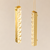 Lustre personnalisé à barres de cristal longues, plaque de plafond dorée, suspension LED protectrice pour les yeux, garantie 2 ans pour escalier à plafond haut