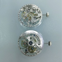 Montre mécanique neuve de marque Hangzhou 2189, boîtier squeletté en métal doré, cadran blanc, bracelet en acrylique, fermoir caché