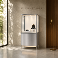 Vitrines à bijoux minimalistes de luxe, disponibles en couleurs personnalisées, idéales pour les centres commerciaux haut de gamme et les bijouteries.