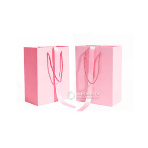 Custom Printed Boutique Cardboard Paper Bags Wholesale Small Jewelry Gift Bag With Three-<b>string</b> Handles - Product Image 1