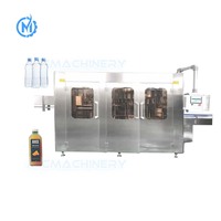 Machine de remplissage de bouteilles en plastique de jus de fruits d'eau minérale de capsulage de liquide automatique rotatif