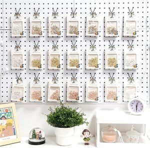 ตะขอแขวนเพ็กบอร์ดแบบ L 40 ชิ้น สีดำ ผลิตในเวียดนาม ตะขอและรางสำหรับติดเพ็กบอร์ด วัสดุเหล็ก สไตล์อุตสาหกรรม ขนาด 406*406*20 มม. - Product Image 1