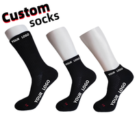 Chaussettes de compression unisexes en coton noir Crew Sport avec caractéristiques respirantes absorbant la sueur demi-coussin logo décontracté sur le bas
