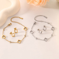 Set Perhiasan Anting dan Gelang Titanium Steel Berlubang Motif Bunga Kecil dengan Zirkon untuk Wanita, Cocok untuk Kantor/Karir, Promosi Iklan