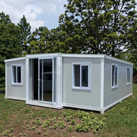 Maison conteneur préfabriquée modulaire mobile respirante rectangulaire moderne en panneaux sandwich d'acier, villa hôtel à énergie solaire