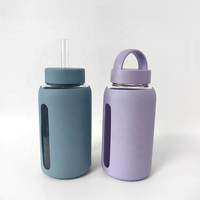 Bouteille d'eau en verre borosilicate avec logo personnalisé et manchon en silicone, gobelet en verre de 600 ml pour la salle de sport en plein air