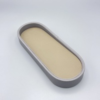 Boîte de rangement ovale en cuir haut de gamme pour télécommande, design luxe américain, pour hôtel