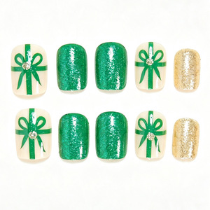 Faux ongles à presser de Noël vert olive avec nœud cadeau et paillettes dorées, élégants et illuminants pour les fêtes, le salon et le DIY - Product Image 4