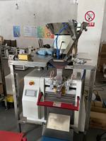 Machine à ensacher automatique pour sacs en rouleaux, ensacheuse automatique, solution d'emballage et de comptage automatique