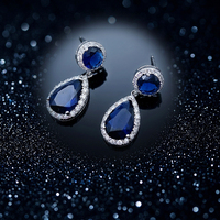 Boucles d'oreilles pendantes double halo en saphir bleu pour mariée, plaqué argent, pavé de CZ étincelant, hypoallergéniques, bijoux de mariage OEM/ODM 2026