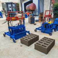 Machine à fabriquer des briques en ciment d'Afrique, type élargi, prix bas et populaire, produit des blocs à partir de pierre