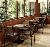 Ensemble de salle à manger moderne Wild Nature avec chaises latérales en rotin pour hôtels et cafés, idéal pour des environnements de repas décontractés