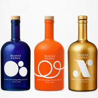 Bouteille à liqueur en verre avec peinture en spray noir or argent orange avec sérigraphie givrée