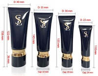Emballage cosmétique personnalisé, tube ovale pour fond de teint 30ml 50ml 100ml, emballage noir personnalisé de luxe, tube en plastique pour nettoyant visage