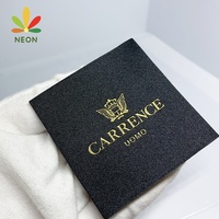 Étiquettes et étiquettes de taille tissées par logo de nom personnalisé de polyester lavable de prix usine pour des vêtements et des pantalons