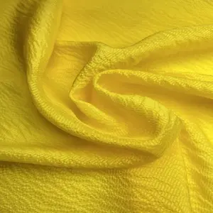 Luxury Feeling 100% Silk Material Dying Yellow Color Jacquard Rib Crepe Fabric For Fashion Women Garments