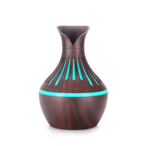 Diffuseur d'arômes en forme de vase creux, mini humidificateur à pétales, alimenté par USB, lumière 7 couleurs, version améliorée pour usage domestique - Product Image 1