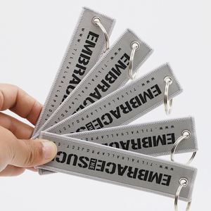 Porte-clés Jet Tag personnalisé avec logo et message de motivation, pour marques lifestyle, articles de collecte de fonds pour organisations non-profit, étiquettes de vol - Product Image 2
