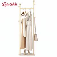 Porte-vêtements de luxe léger style crème, moderne et minimaliste, pour chambre à coucher, porte-manteau multifonctionnel et mobile en fer pour salon