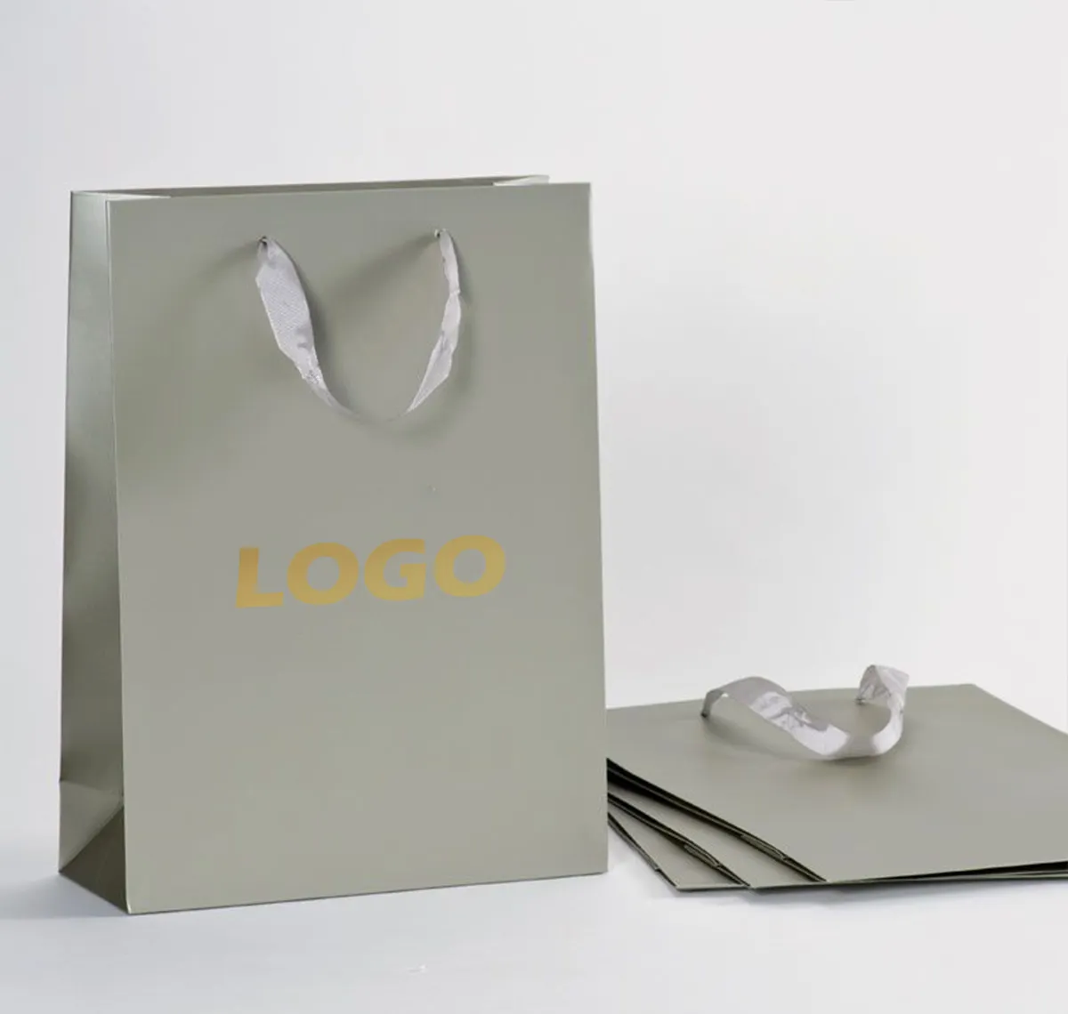 Bolsas de compras grandes de cartón blanco biodegradable Bolsa de papel reutilizable plegable de lujo