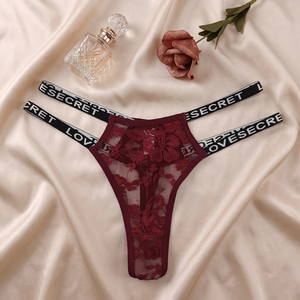 Tanga de encaje floral para mujer con letras impresas, tiras finas múltiples, malla transparente, diseño hueco, cintura baja, sexy, lencería OEM ODM - Product Image 3