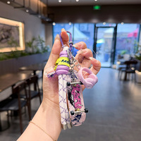 Mini skateboard à doigts porte-clés, pendentif graffiti pour sac, breloque en corde tressée, pendentif skateboard coloré pour sac à dos, vente en gros