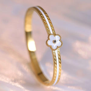 Bracelet unisexe en acier inoxydable avec pendentif trèfle à quatre feuilles en coquille blanche, plaqué or 18 carats, zircone, tendance et à la mode - Product Image 5