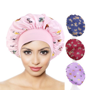 Syh878 Bonnet en soie de luxe avec imprimé papillon et fleur sur la bande Bonnets en satin Chapeau et enveloppes en satin pour cheveux bouclés - Product Image 1