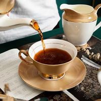 Ensemble de tasses à thé en porcelaine osseuse de style grec/avec un motif plaqué or et bord doré/disponible en 6, 12 et 21 pièces