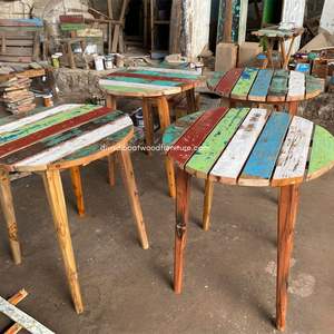 Découvrez le charme intemporel de la table ronde Fik Gap, confectionnée en teck rustique 70x70x75 CM, pour une ambiance cosy et naturelle. - Product Image 5