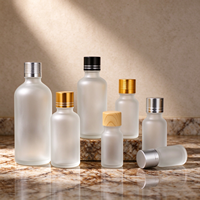 Vente en gros de flacons compte-gouttes en verre blanc mat givré de 15 ml, 20 ml, 30 ml, 50 ml, 100 ml avec des embouts compte-gouttes dorés