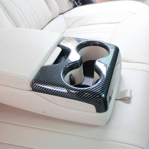 KORLOT Accessoires d'intérieur de voiture pas chers, couvercle de porte-gobelet d'<span class=keywords><strong>accoudoir</strong></span> arrière en plastique, garniture pour Chrysler 300 modèle 2015-2021 - Product Image 1