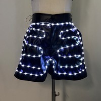 Pantalon en cuir LED clignotant, tenue de soirée lumineuse, short en cuir pour performance scénique, vêtements lumineux pour club, rave et événements musicaux
