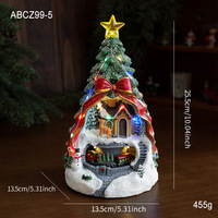 Maison de Noël en résine colorée avec train rotatif, lumières illuminées, boîte à musique, décorations de Noël pour bureau