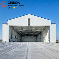 Hangar d'avion préfabriqué personnalisable résistant aux séismes, bâtiment métallique durable pour le stockage de jets de l'aviation civile américaine