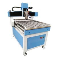 Machine de gravure CNC UBO 6090 1212 Mini avec Nc Studio Mach 3 DSP pour la gravure sur acrylique, bois, PVC, aggloméré