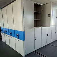 Büyük Kapasiteli Modern Ayarlanabilir Depolama Kapalı Tip Yüksek Yoğunluklu Mobil Dolap / Metal Kompakt Tekerlekli Raf Okul Spor Salonu Kütüphane