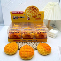 Vente en gros usine : Jouet sensoriel anti-stress à presser, en forme de boule de pudding au caramel et de bloc de construction, avec son croquant et simulation de boulette de maïs, sensation de chaleur