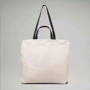 Sac fourre-tout en toile de coton personnalisé pour femme, nouveau style, motif lettres, taille moyenne, recyclable, avec poignée en corde, idéal pour le travail et les cours. - Product Image 1