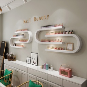 ชั้นวางขวดน้ำยาทาเล็บรูปตัวยูติดผนัง สีขาว ทำจากไม้ สำหรับร้านเสริมสวย ใช้เก็บขวดน้ำยาทาเล็บและกาว - Product Image 1