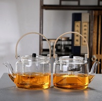 Vente en gros de théière en verre borosilicaté avec manche en bois de bambou théière bouillante résistante à la chaleur