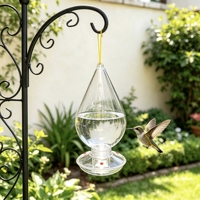 Mangeoire à colibris suspendue en forme de goutte d'eau, transparente, en plastique, avec ouvertures pour l'alimentation des fleurs, grand récipient de stockage