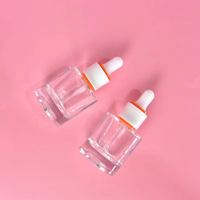 Vente en gros de flacons en verre transparent de 30 ml pour soins de la peau, imprimés en sérigraphie, flacons compte-gouttes ronds pour sérum et huile essentielle