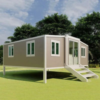 Maison conteneur extensible Voros 40 pieds à double aile, panneaux sandwich, design moderne du milieu du siècle, 2 chambres, caractéristique respirante, 74 m²