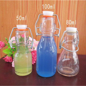 50ml 80ml 100mL 350ml 500ml Botella <span class=keywords><strong>de</strong></span> vidrio transparente redonda a prueba <span class=keywords><strong>de</strong></span> fugas con tapón <span class=keywords><strong>de</strong></span> rosca <span class=keywords><strong>de</strong></span> bloqueo para bebidas Jugo <span class=keywords><strong>Licor</strong></span> <span class=keywords><strong>casero</strong></span> - Product Image 1