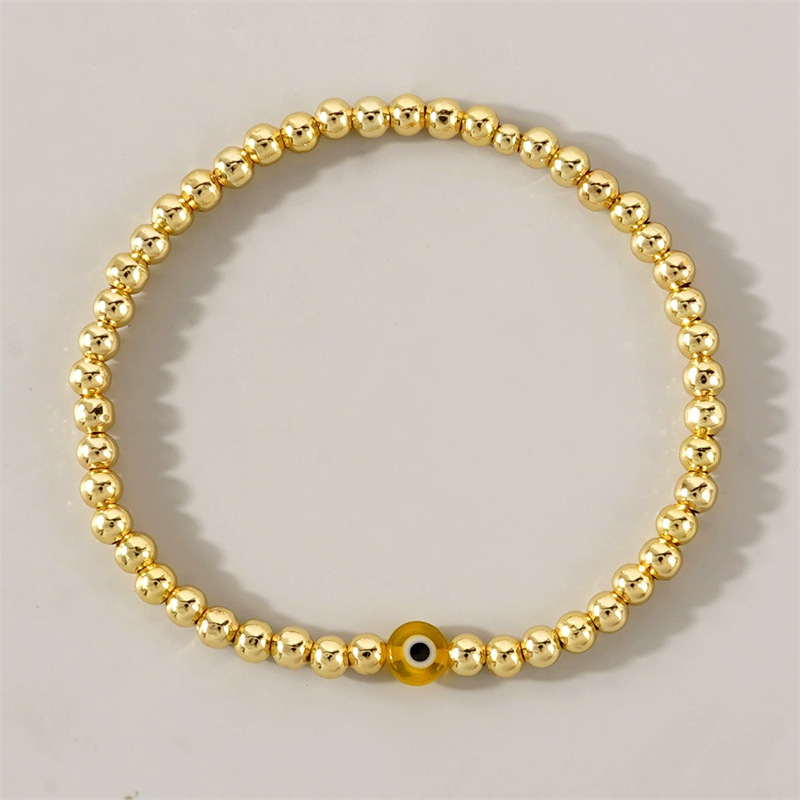 Golden beaded Yellow Devils Eye (No card)