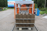 Chine Machine Automatique à Briques en Ciment Bloc QT5-15, Idées Commerciales d'Usine de Pavés avec Petit Investissement