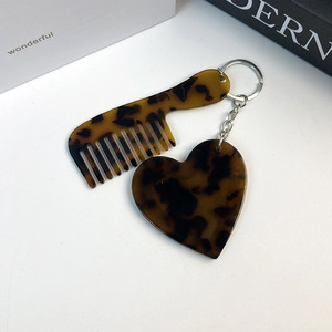 Mini Pettine Portatile SAIYII di Alta Qualità a Forma di Cuore con Specchio Piccolo Pettine in Acetato a Denti Larghi Effetto Marmo Accessori per Capelli Portachiavi - Product Image 4
